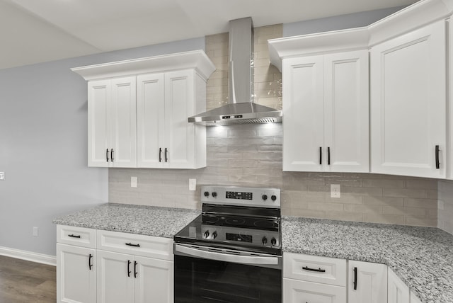 204 Max Cavnes Rd, Danville, KY 40422 - kitchen featuring tasteful backsplash, stainless steel electric stove, wall chimney exhaust hood, and white cabinets