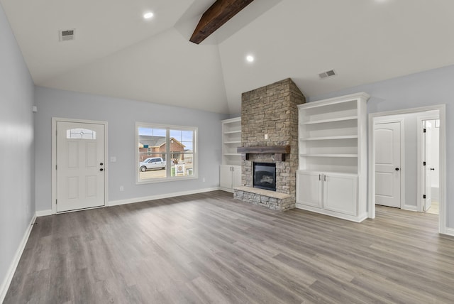 204 Max Cavnes Rd, Danville, KY 40422 - unfurnished living room with visible vents, beamed ceiling, and wood finished floors