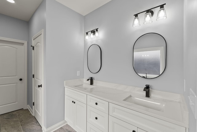 204 Max Cavnes Rd, Danville, KY 40422 - full bath with a sink, baseboards, and double vanity