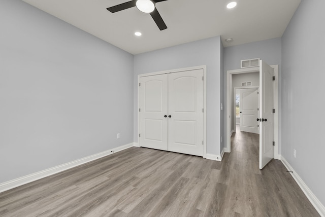 204 Max Cavnes Rd, Danville, KY 40422 - unfurnished bedroom with visible vents, wood finished floors, baseboards, and a closet