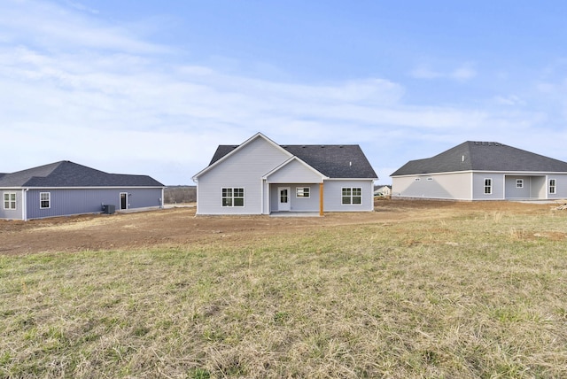 204 Max Cavnes Rd, Danville, KY 40422 - back of house with a patio and a lawn