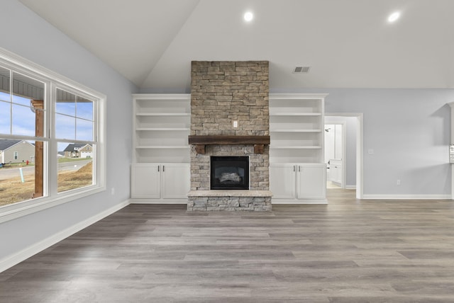 204 Max Cavnes Rd, Danville, KY 40422 - unfurnished living room featuring visible vents, baseboards, wood finished floors, and a fireplace