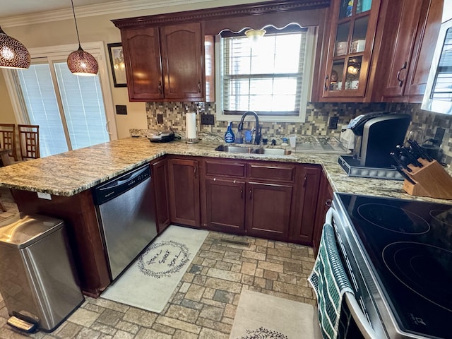 kitchen with a peninsula, hanging light fixtures, stainless steel appliances, crown molding, and a sink