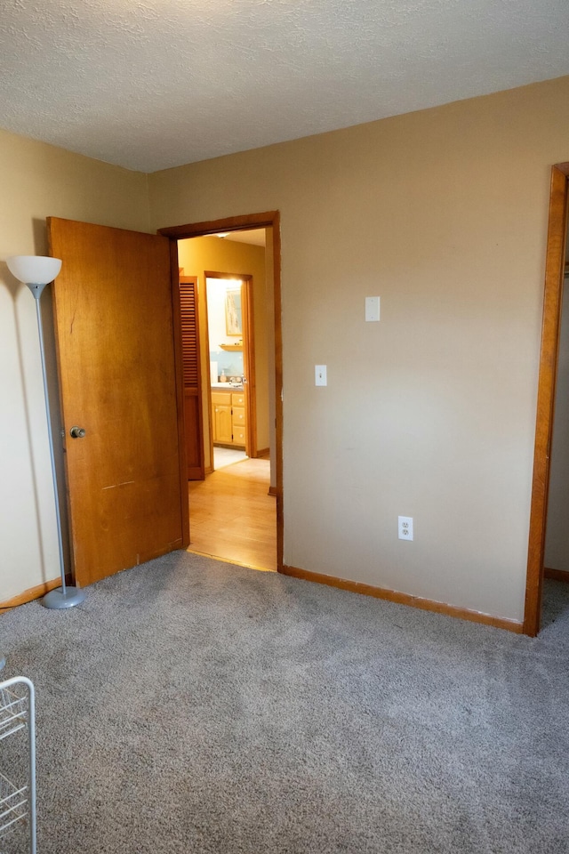 39 Meadow Dr, Stanton, KY 40380 - carpeted empty room with a textured ceiling