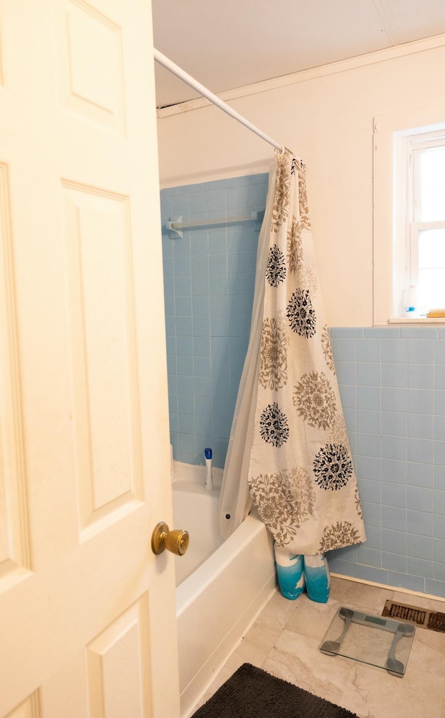 39 Meadow Dr, Stanton, KY 40380 - bathroom with tile walls, tile patterned flooring, and shower / bath combo