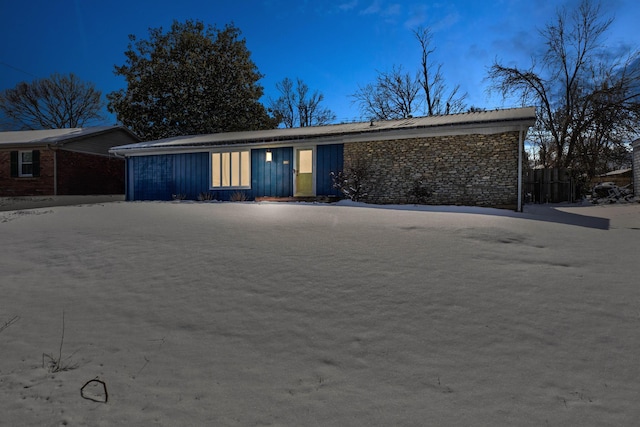 mid-century inspired home featuring board and batten siding