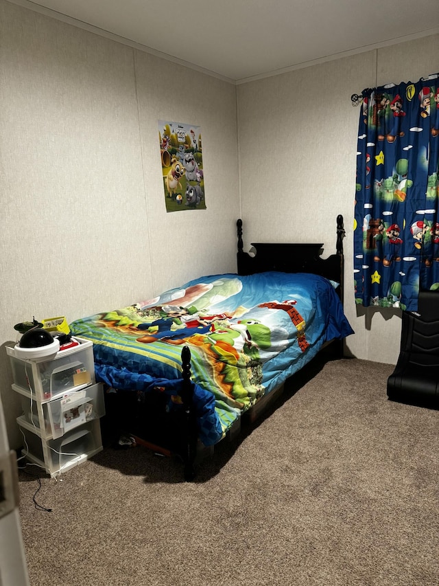 bedroom with carpet floors and ornamental molding