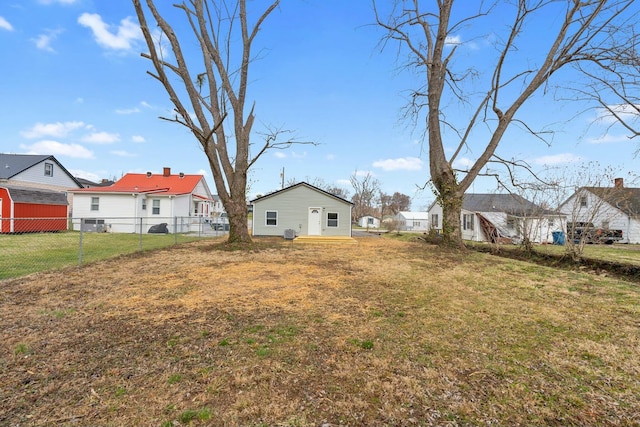 view of yard with fence and a residential view