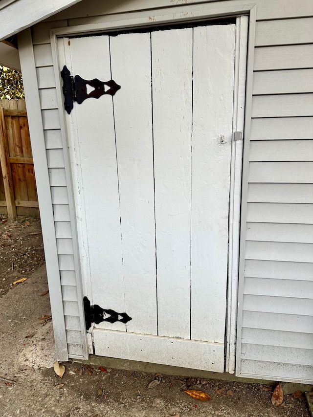 view of outdoor structure featuring fence