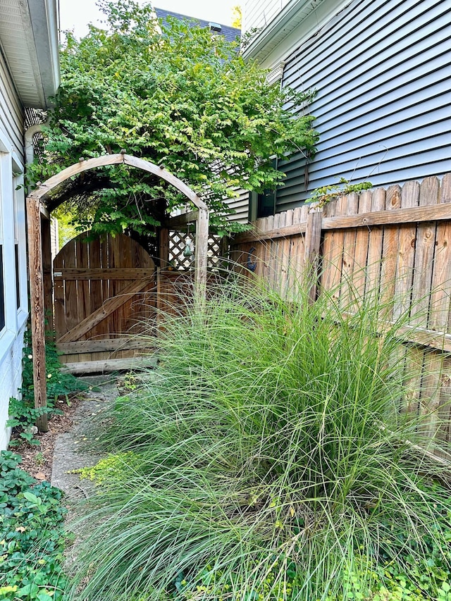 view of yard featuring a gate and fence