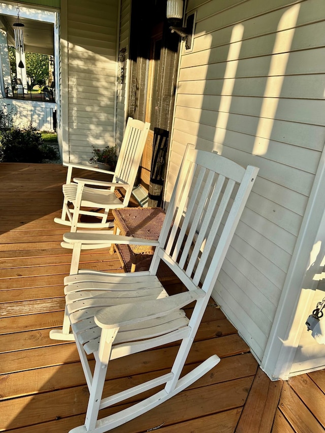 wooden deck featuring a porch