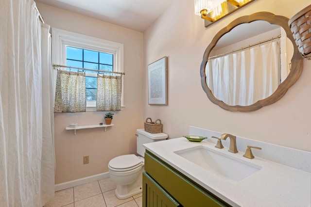 full bathroom with baseboards, vanity, toilet, and tile patterned floors