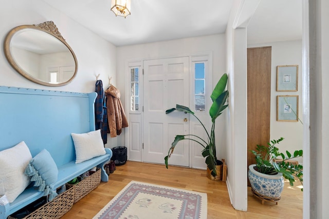 foyer entrance with wood finished floors