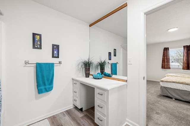 bathroom featuring wood-type flooring