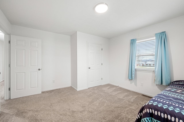 bedroom featuring carpet