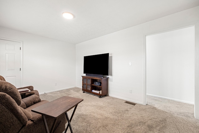 living room with light colored carpet