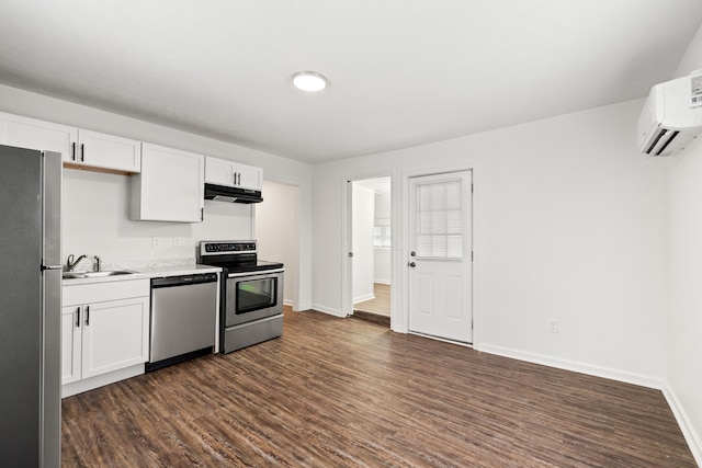 kitchen with white cabinetry, dark wood-type flooring, appliances with stainless steel finishes, and sink