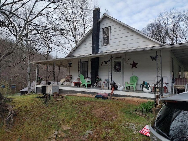 farmhouse-style home with covered porch