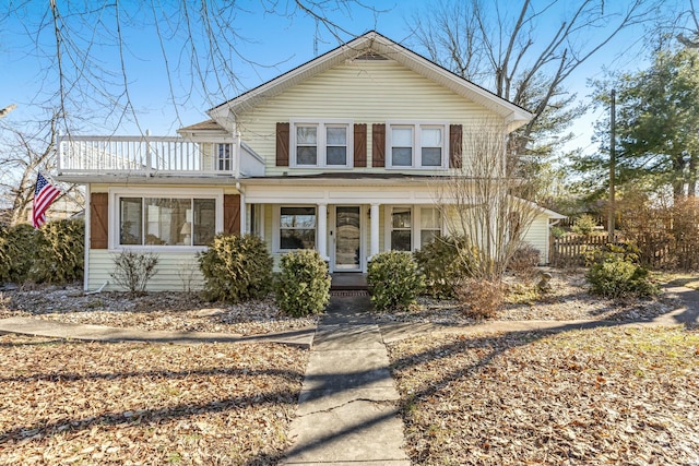 traditional home featuring covered porch