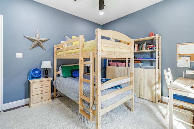 bedroom featuring ceiling fan and light colored carpet