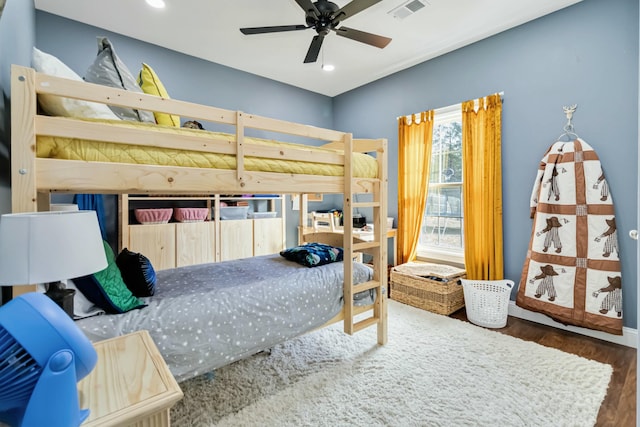 bedroom featuring dark hardwood / wood-style flooring