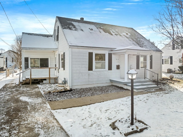 bungalow-style house featuring central air condition unit