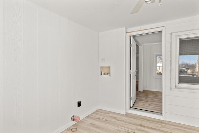 laundry room featuring washer hookup, light hardwood / wood-style flooring, and ceiling fan