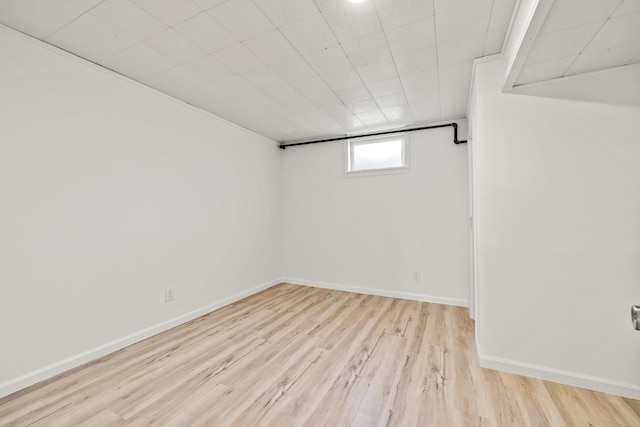 basement with light wood-type flooring