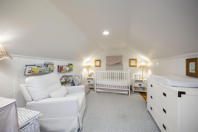 bedroom with lofted ceiling