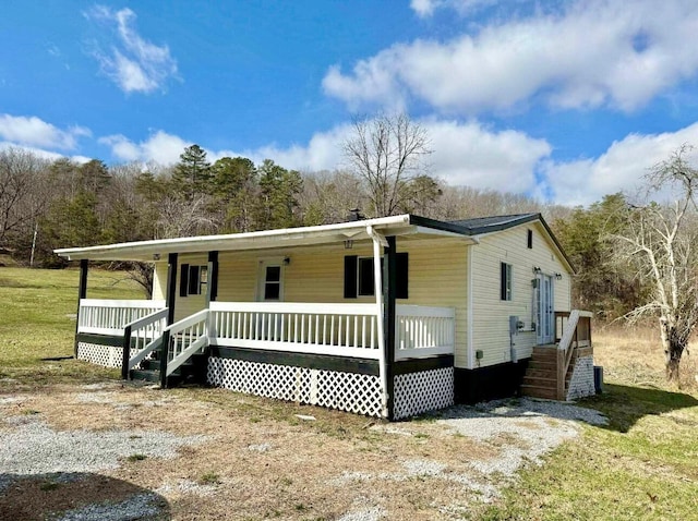 view of front of home featuring covered porch