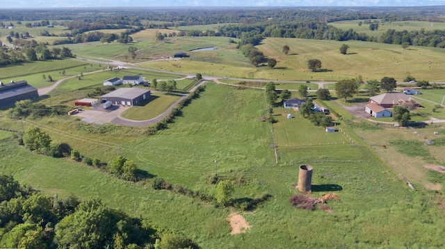 birds eye view of property featuring a rural view