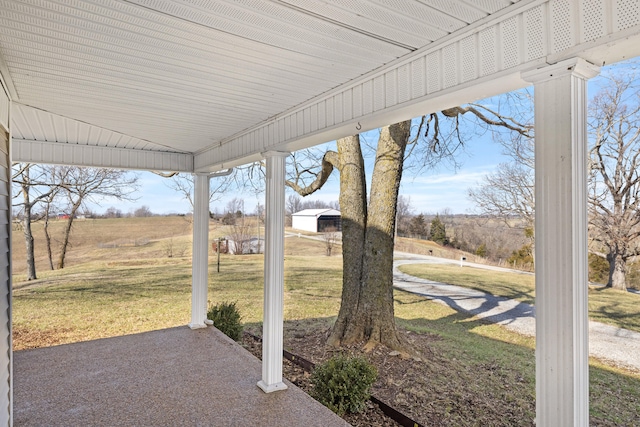 view of patio with a rural view