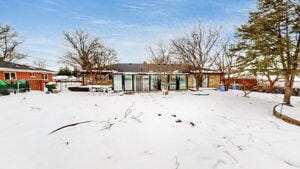 view of snow covered property