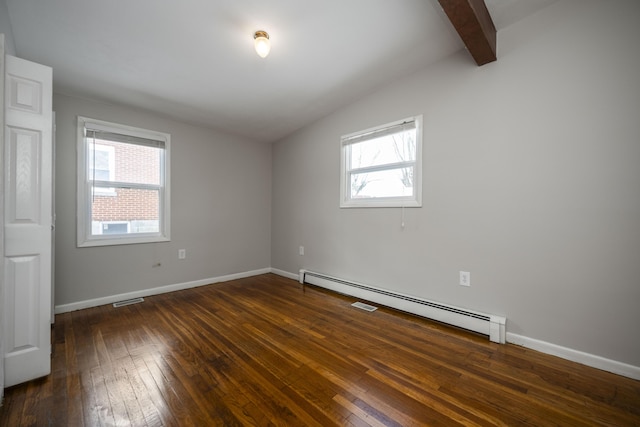 spare room featuring vaulted ceiling with beams, a baseboard radiator, visible vents, baseboards, and dark wood-style floors