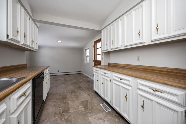 kitchen with a baseboard radiator, butcher block counters, white cabinets, and visible vents