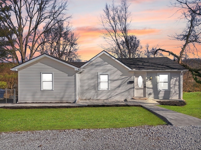 view of front of home with a front lawn