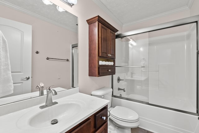 bathroom with shower / bath combination with glass door, toilet, ornamental molding, a textured ceiling, and vanity