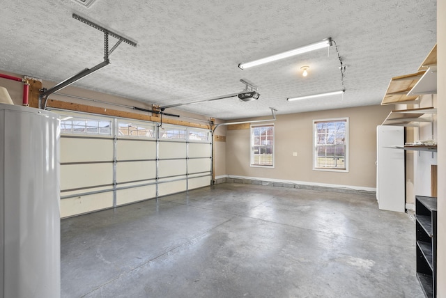 garage featuring baseboards and a garage door opener