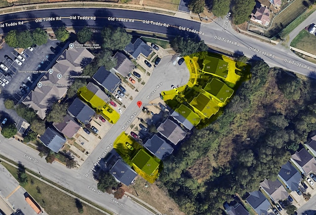 birds eye view of property with a residential view