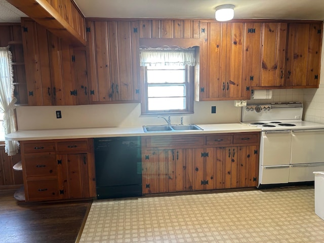 kitchen featuring range with two ovens, a sink, light countertops, brown cabinets, and dishwasher