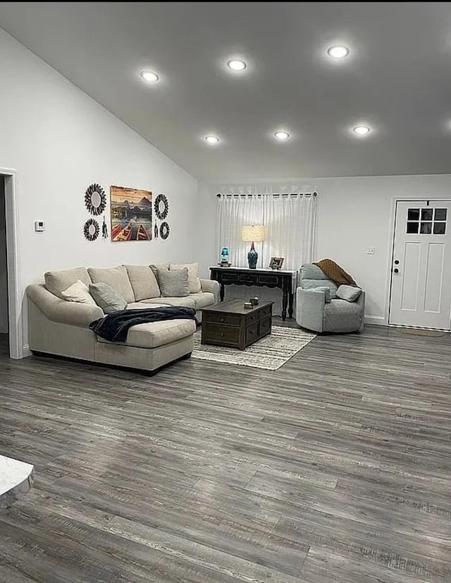 living room with vaulted ceiling, wood finished floors, and recessed lighting