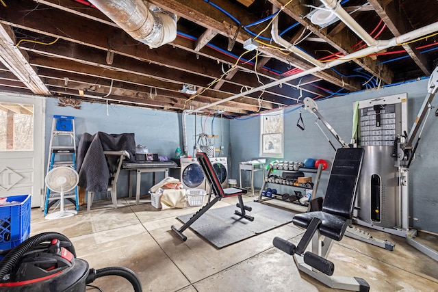 workout room featuring washer and dryer