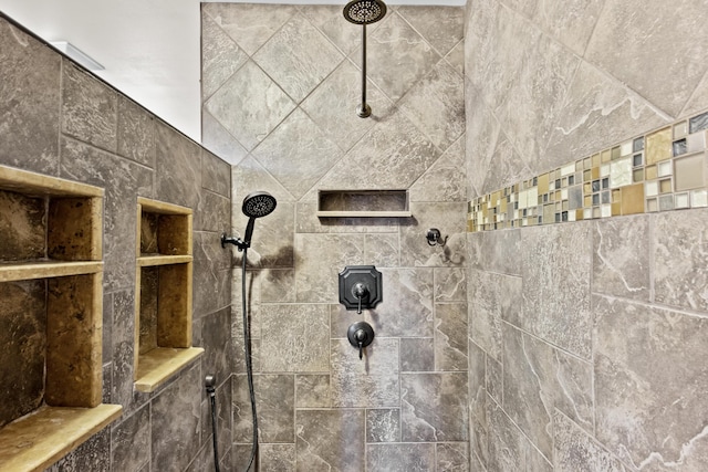 room details featuring a tile shower