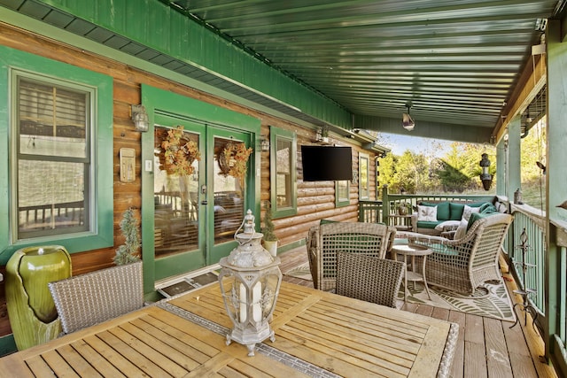 deck featuring french doors and an outdoor hangout area