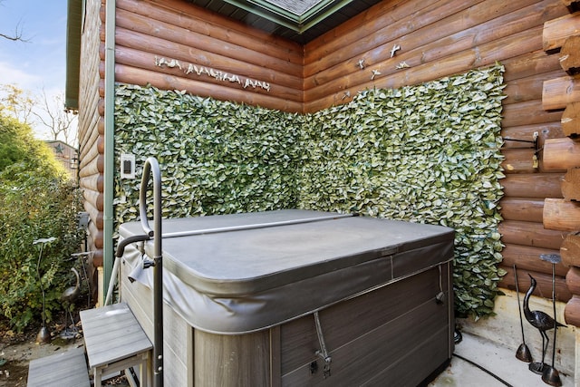 view of patio featuring a hot tub