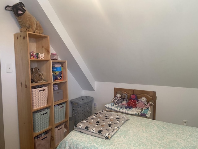 bedroom with vaulted ceiling