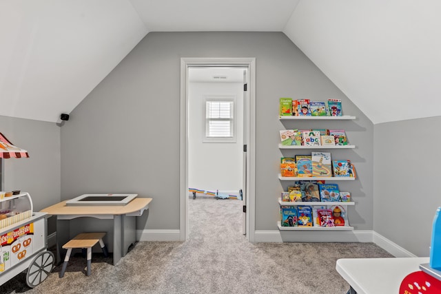 game room featuring lofted ceiling, carpet flooring, and baseboards