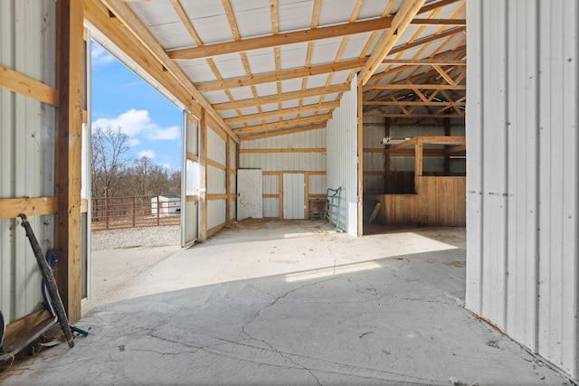 miscellaneous room with lofted ceiling