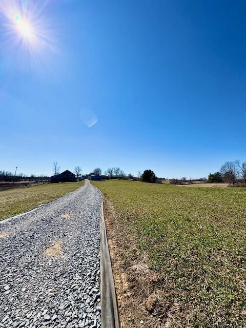 view of road featuring a rural view