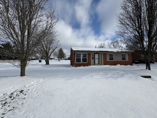 ranch-style house with brick siding